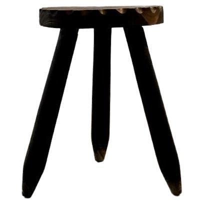 A tripod stool, Modernist, Brutalist, Rustic Modern, Popular Art, in solid wood cut with a beautiful hollow geometric decoration on the edges of the seat, artisan work, to be attributed, France 1950.

DIMENSIONS: 34 x 28 x 27 cm

CONDITION: In