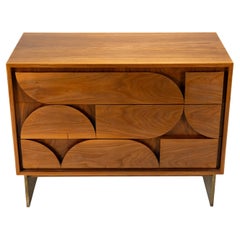 A Brutalist Side Chest with Three Drawers and a Brass Base
