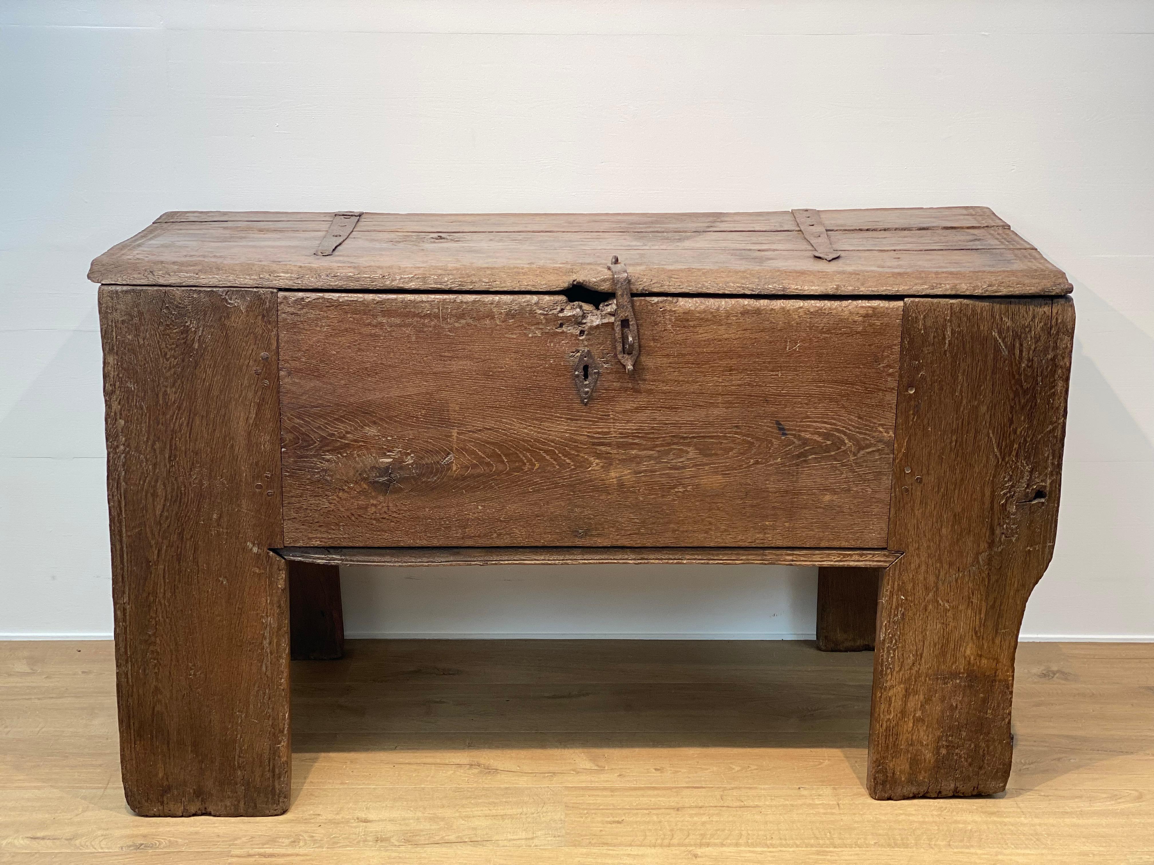 An exceptional German Gothic, Brutalist Coffer,
very simple but strong design ,the coffer has its original Iron lock,
ideal piece of furniture to place in a modern and contemporary interior,
warm patina and color of the Blonde Oak wood,
the coffer