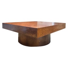 A burl wood coffee table in the style of Milo Baughman, circa 1970s