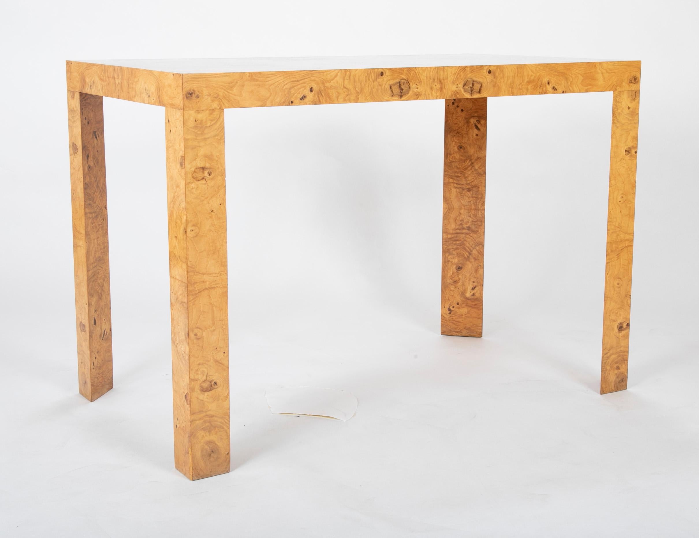 A Parsons console / writing table with faceted triangular legs and rectangular top. marked Dunbar with dated paper tag, 1976.