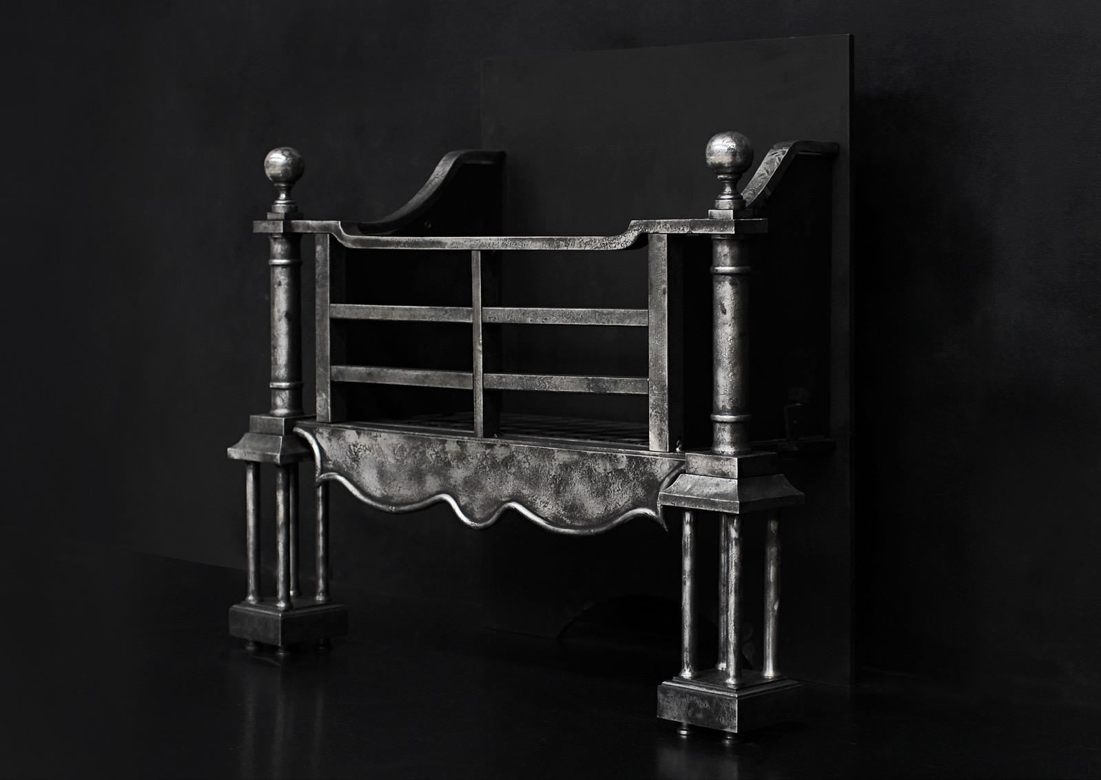 A Burnished Steel Firegrate in the Georgian Manner For Sale 1