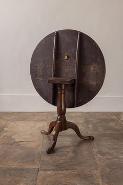 A Burr Elm Tilt Top Table