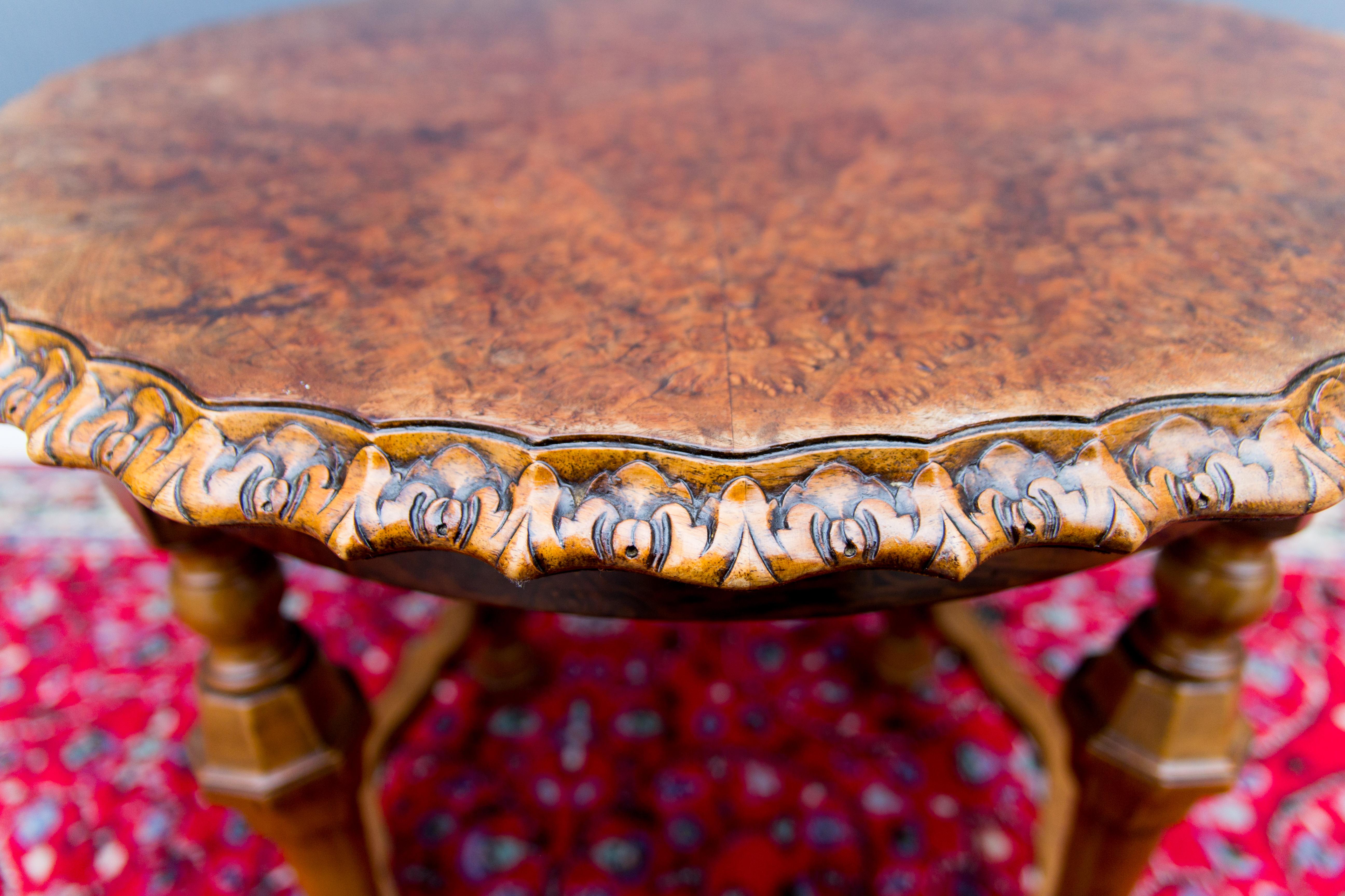 Antique French burr walnut coffee table, circa 1920.
A beautifully shaped round coffee table made from walnut with a burr walnut top and carved-shaped edges. France, circa the 1920s.
Measurements:
Height: 58 cm / 22.83 in
Width: 60 x 60 cm / 23.62 x