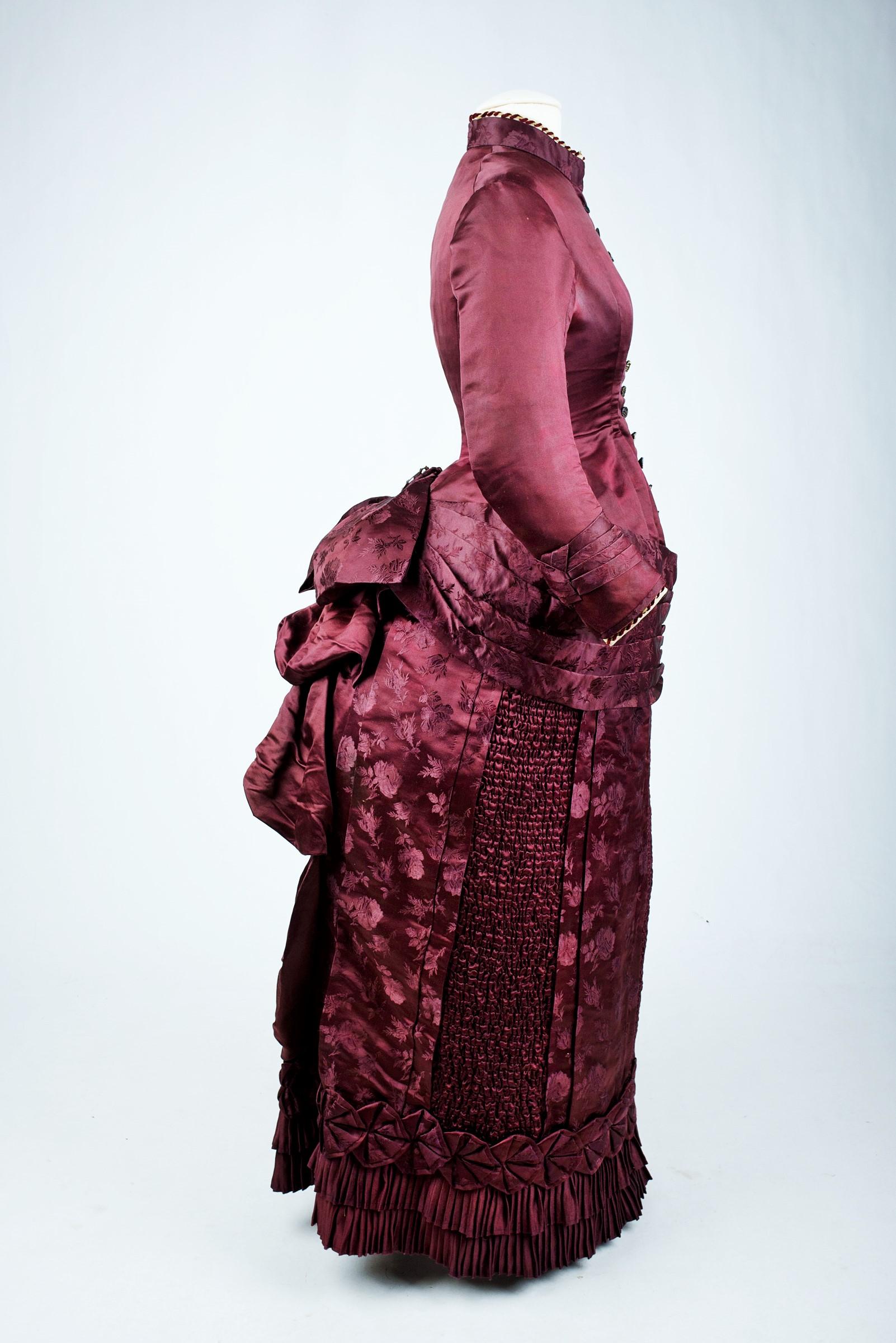 A Bustle Cage Princess line Day Dress in Burgundy satin - France Circa 1885 2