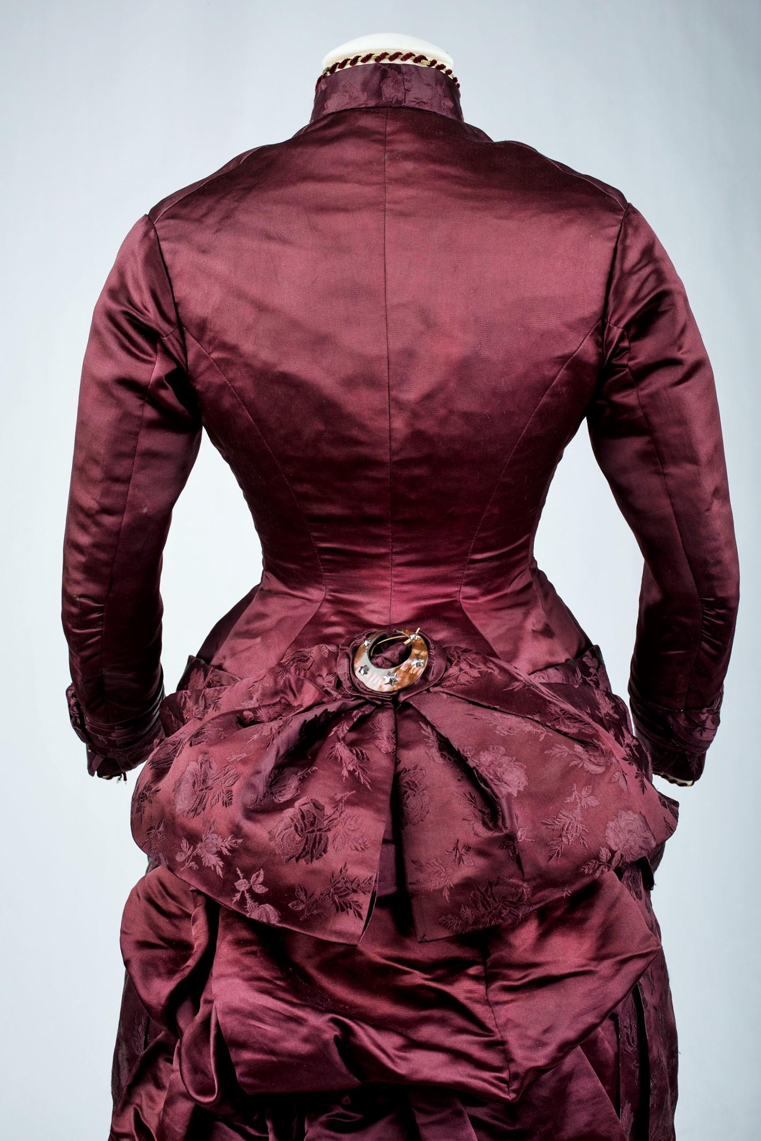 A Bustle Cage Princess line Day Dress in Burgundy satin - France Circa 1885 6