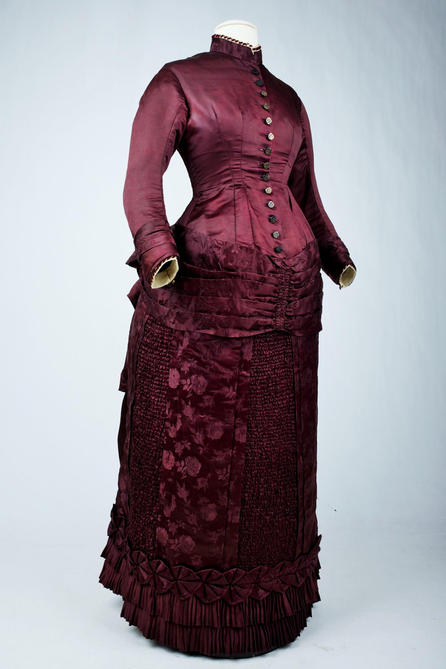 Women's A Bustle Cage Princess line Day Dress in Burgundy satin - France Circa 1885
