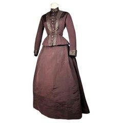 A Bustle cage silk faille Dress with bodice and skirt - France Circa 1890