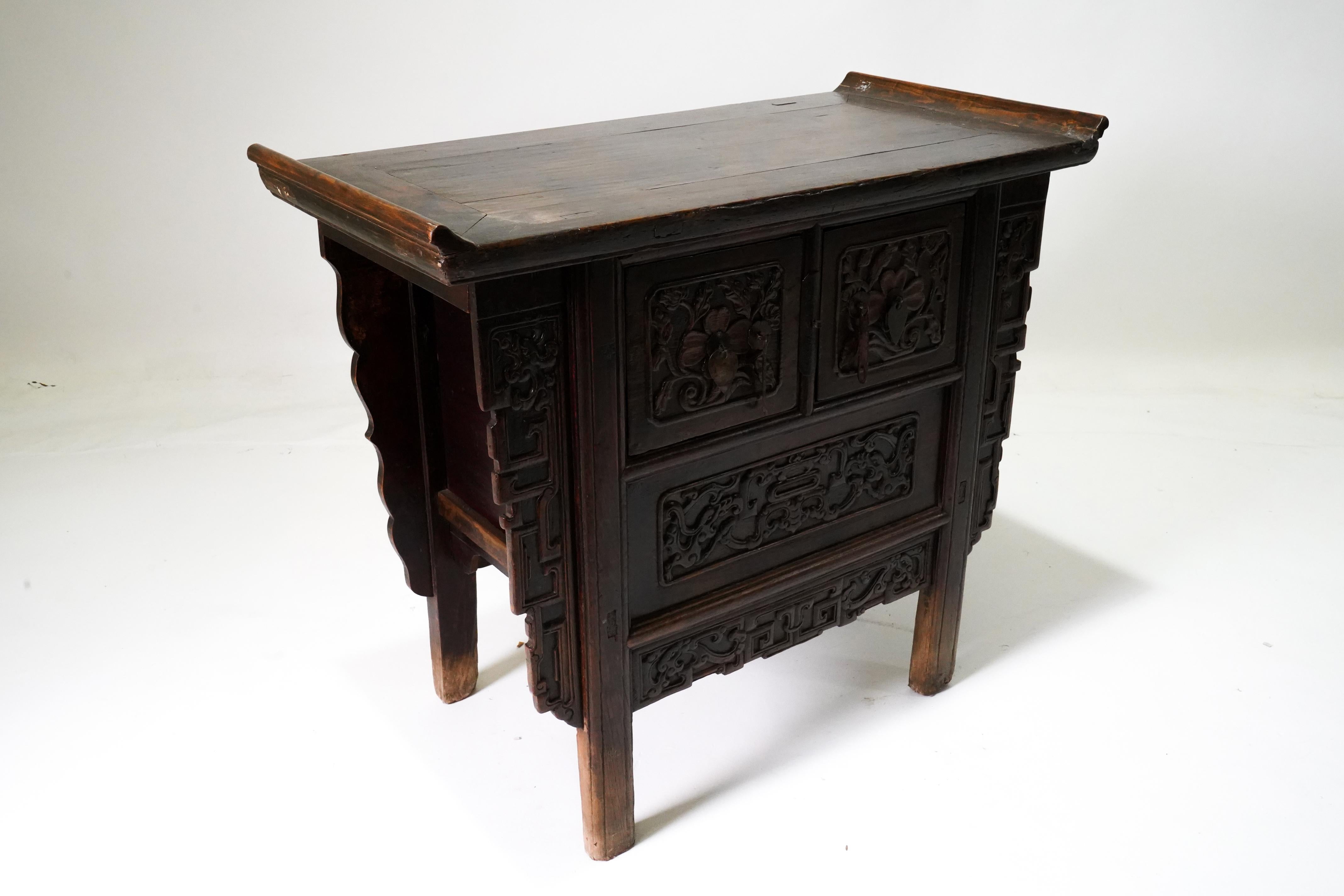Rare C. 1850 Qing Storage Cabinet with Carved Dragon Spandrels In Good Condition For Sale In Chicago, IL