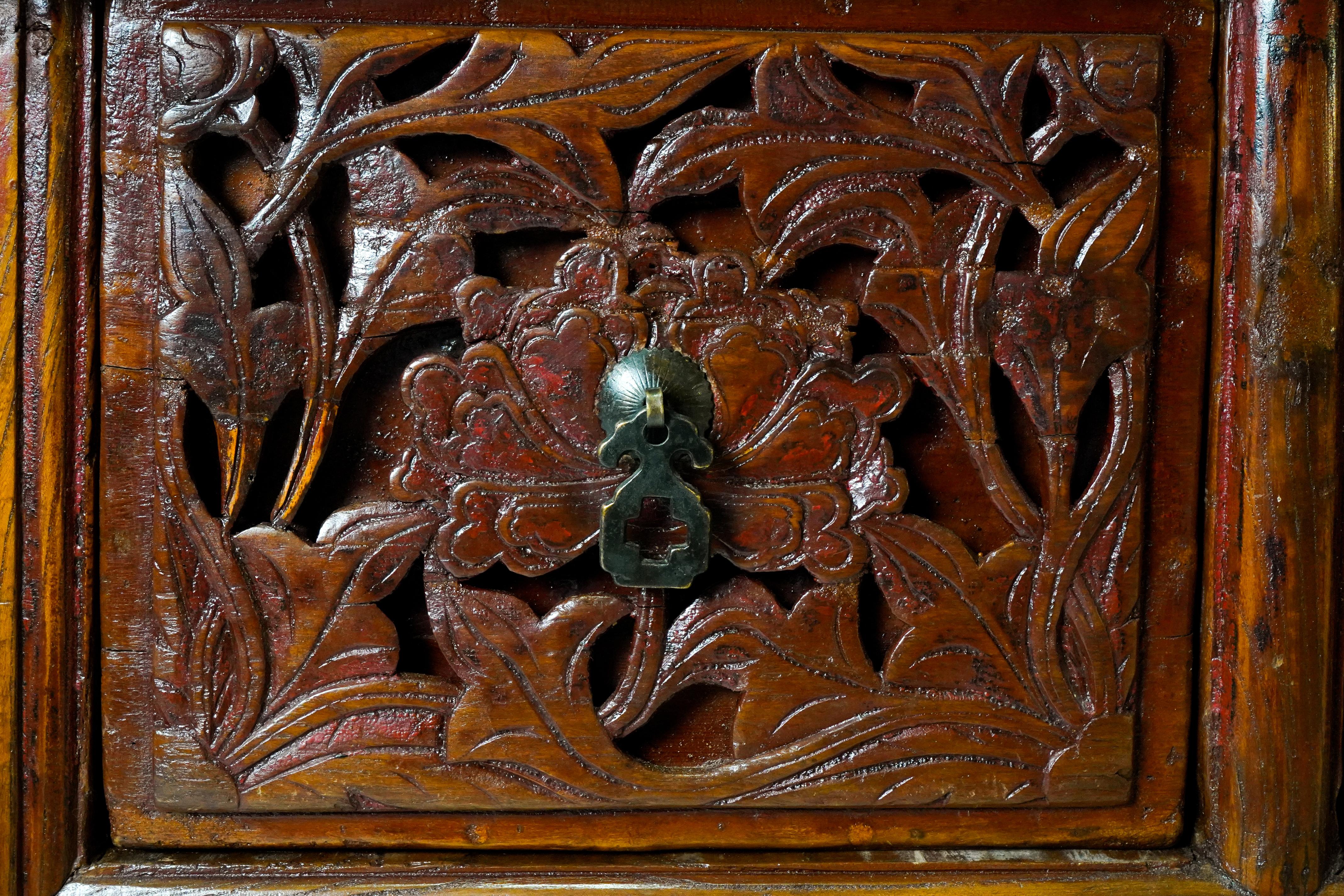 A Butterfly Style Storage Cabinet With Carved Spandrels For Sale 6