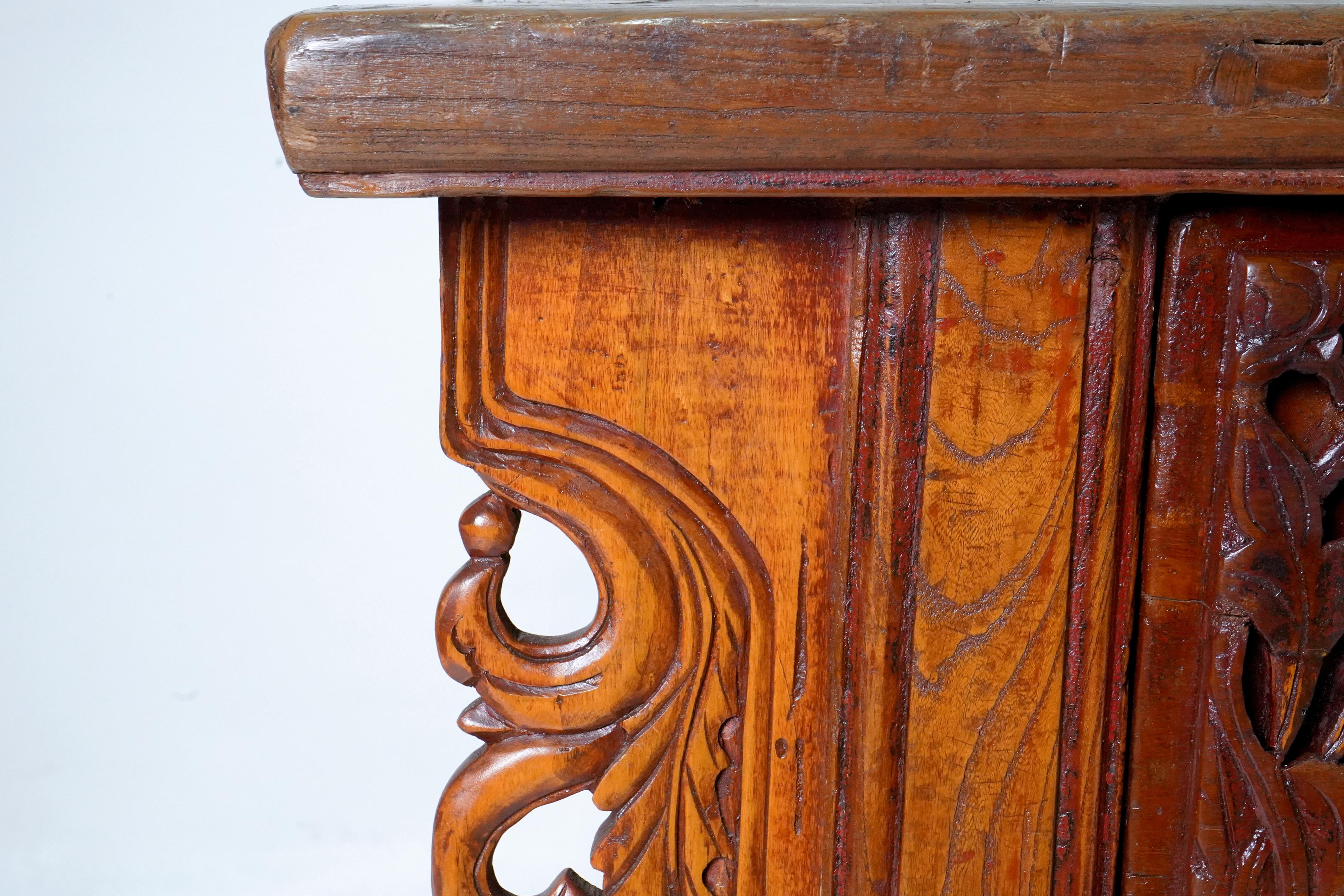 A Butterfly Style Storage Cabinet With Carved Spandrels For Sale 11