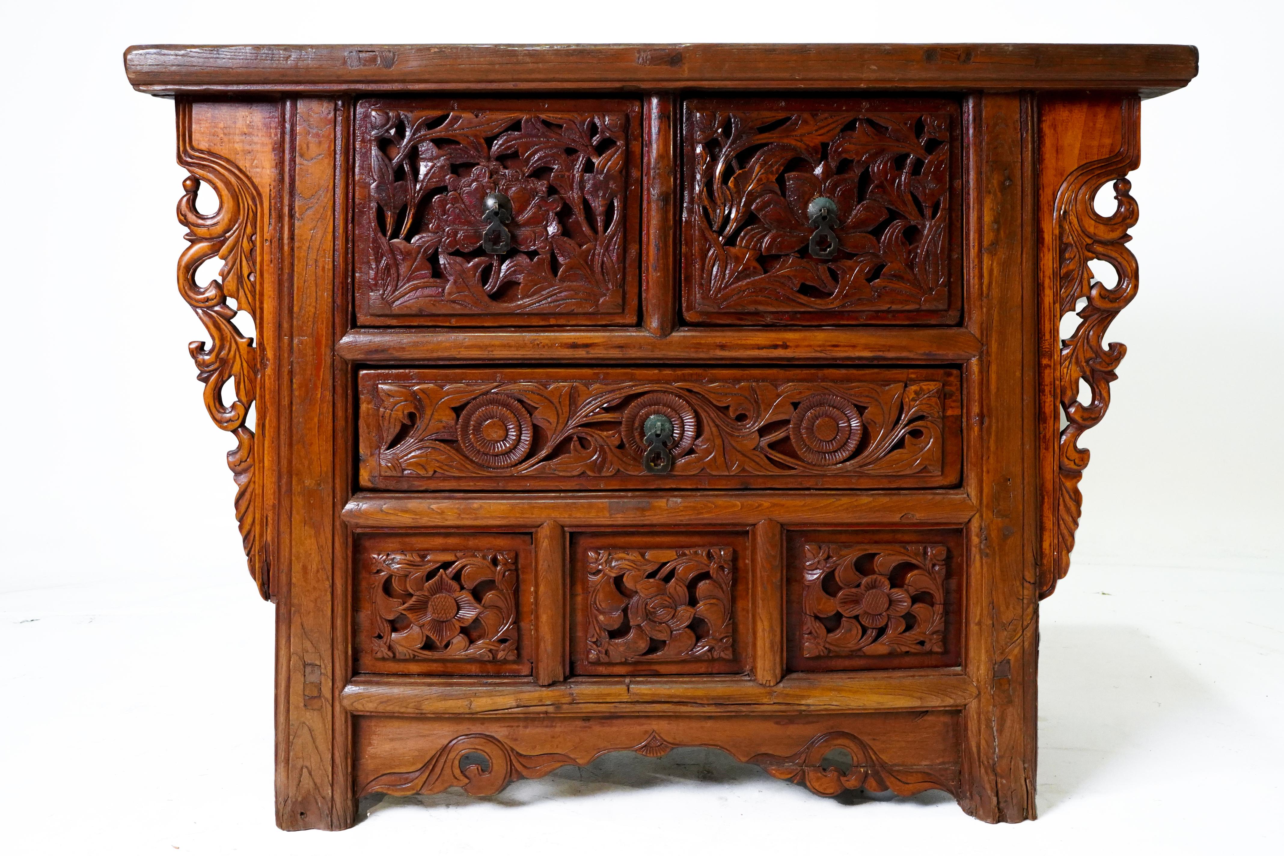 A Butterfly Style Storage Cabinet With Carved Spandrels For Sale 1