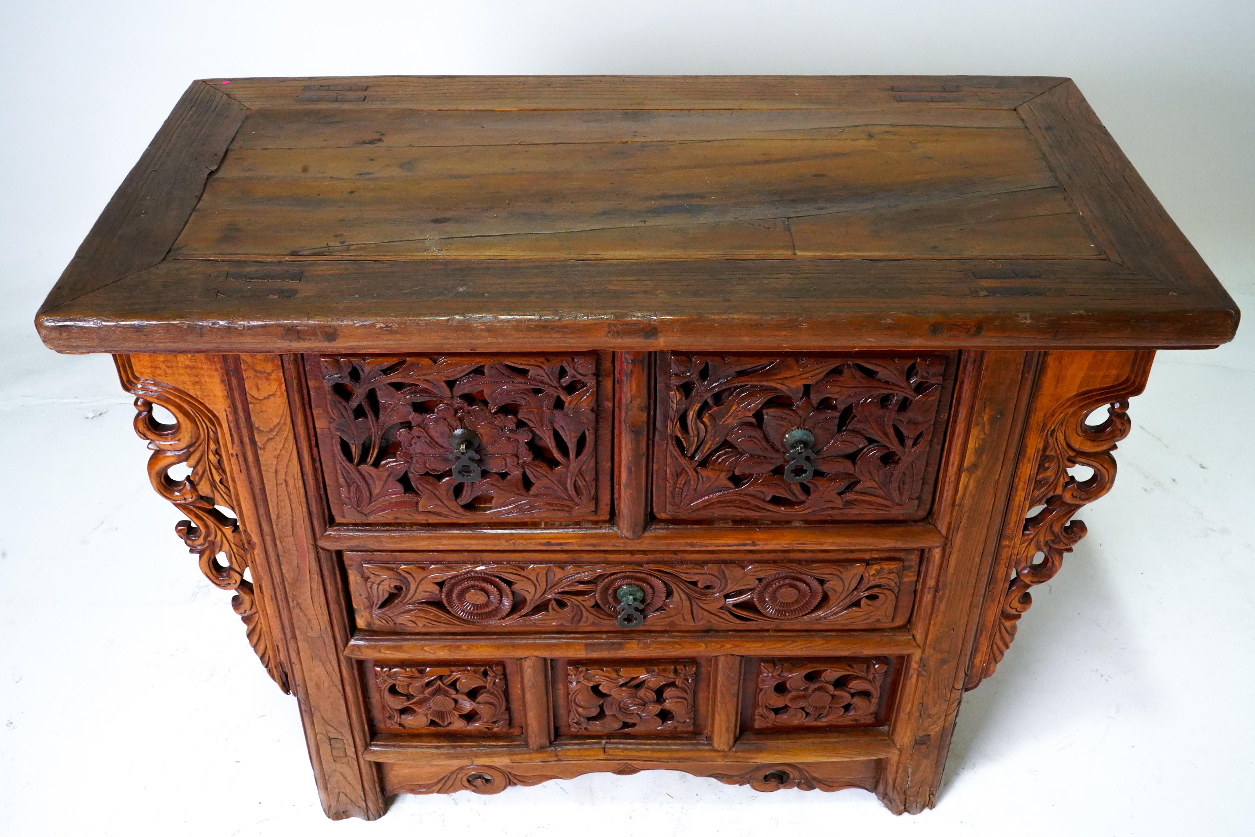 A Butterfly Style Storage Cabinet With Carved Spandrels For Sale 2