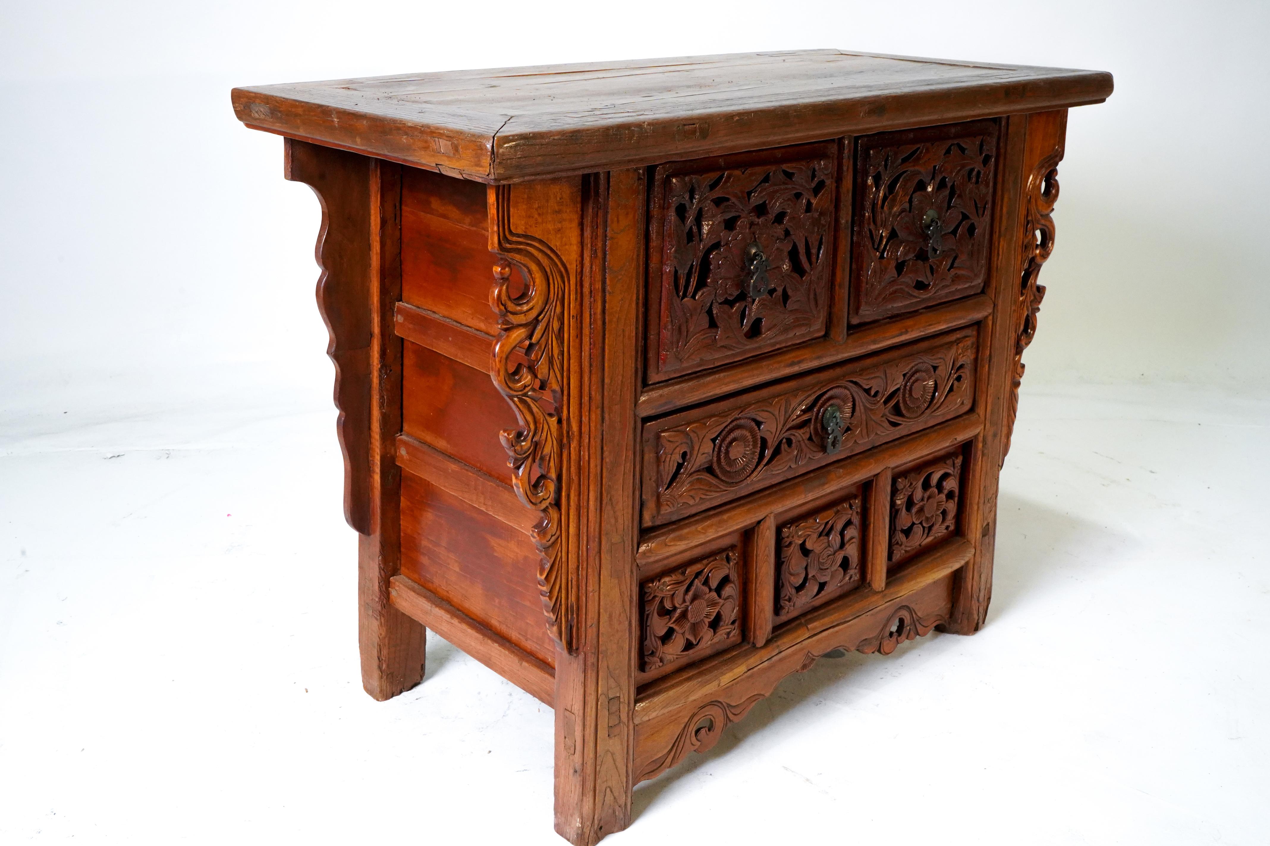 A Butterfly Style Storage Cabinet With Carved Spandrels For Sale 3