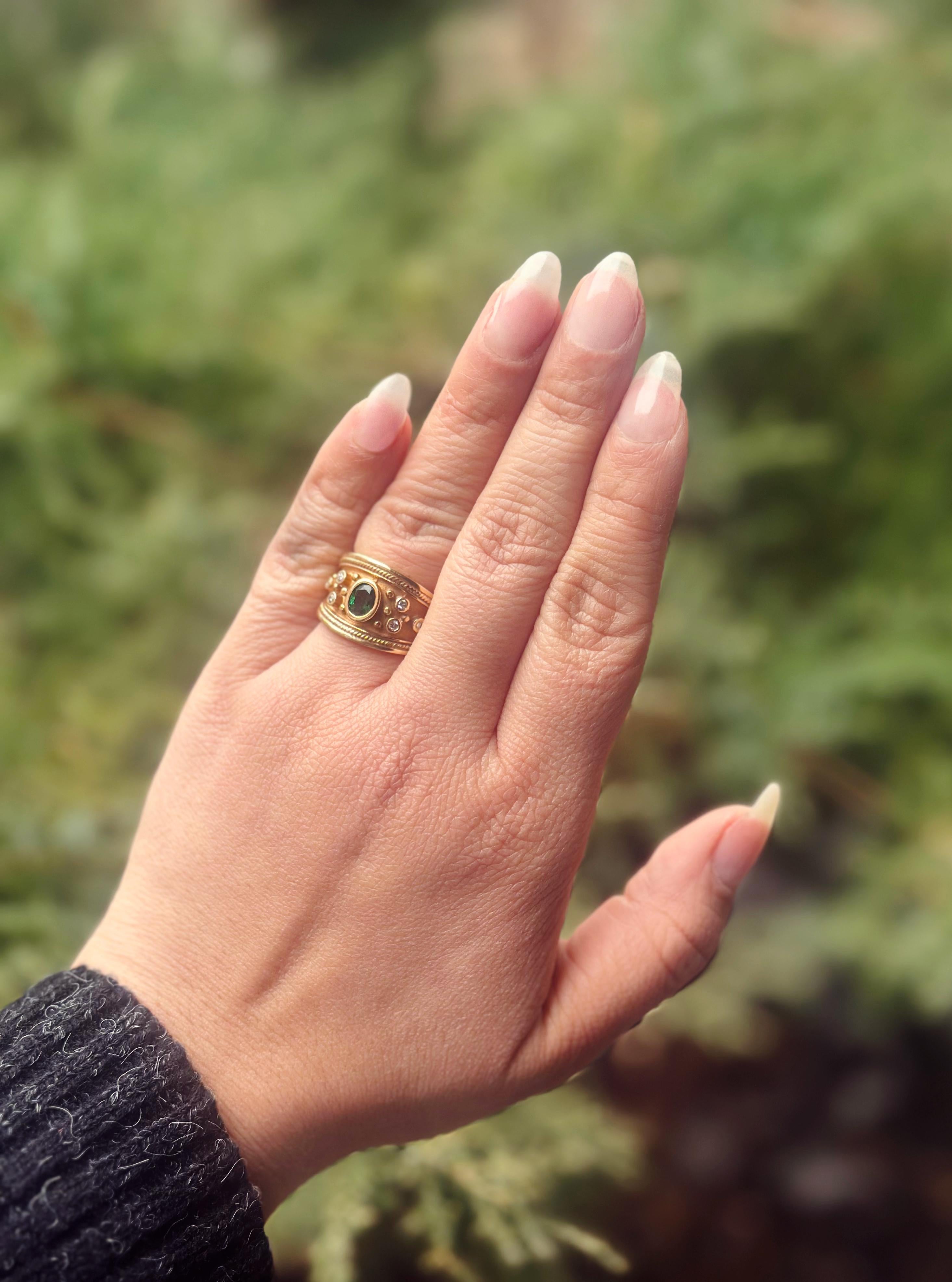 Oval Cut A Byzantine Ring with Oval Emerald and Diamonds made of 14K Yellow Gold For Sale