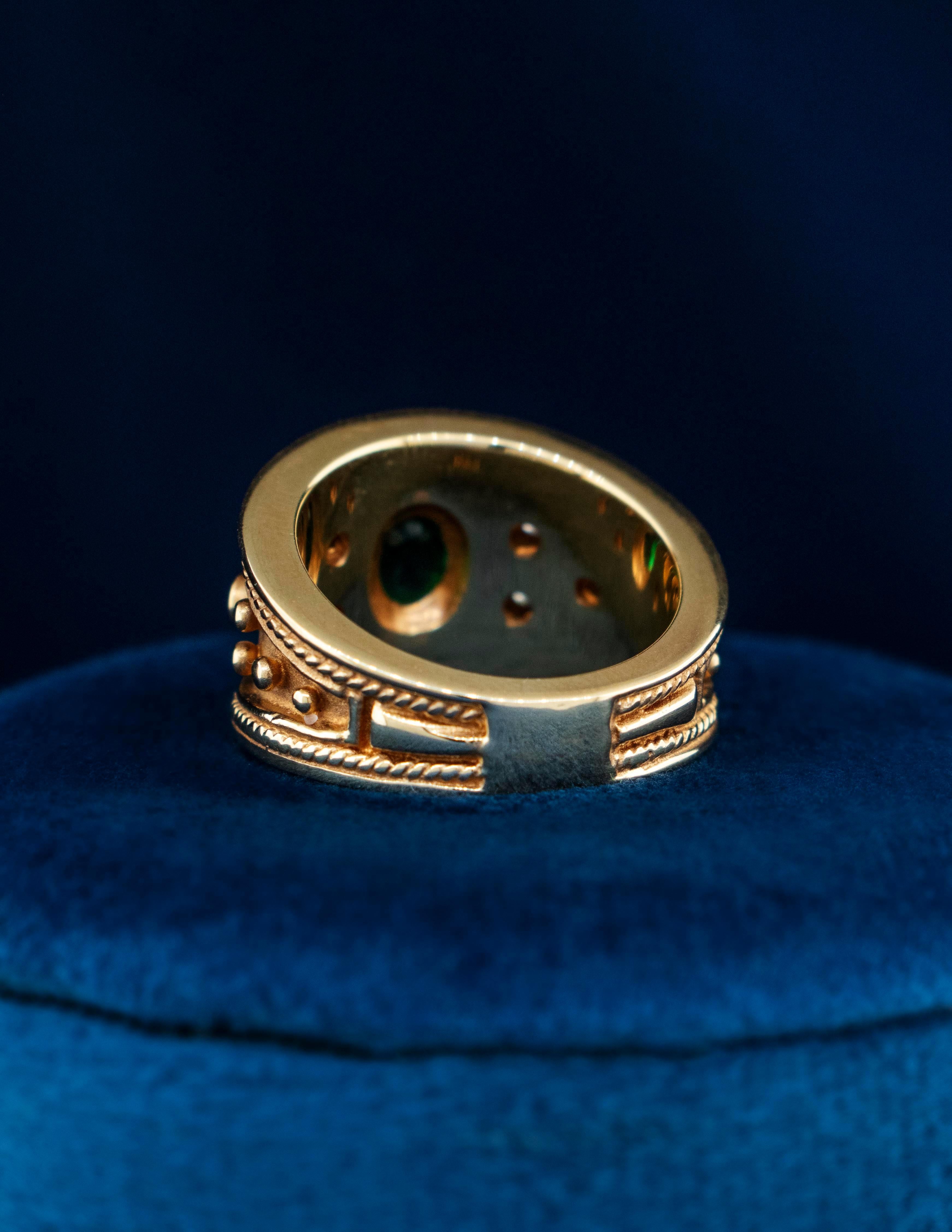 Women's A Byzantine Ring with Oval Emerald and Diamonds made of 14K Yellow Gold For Sale