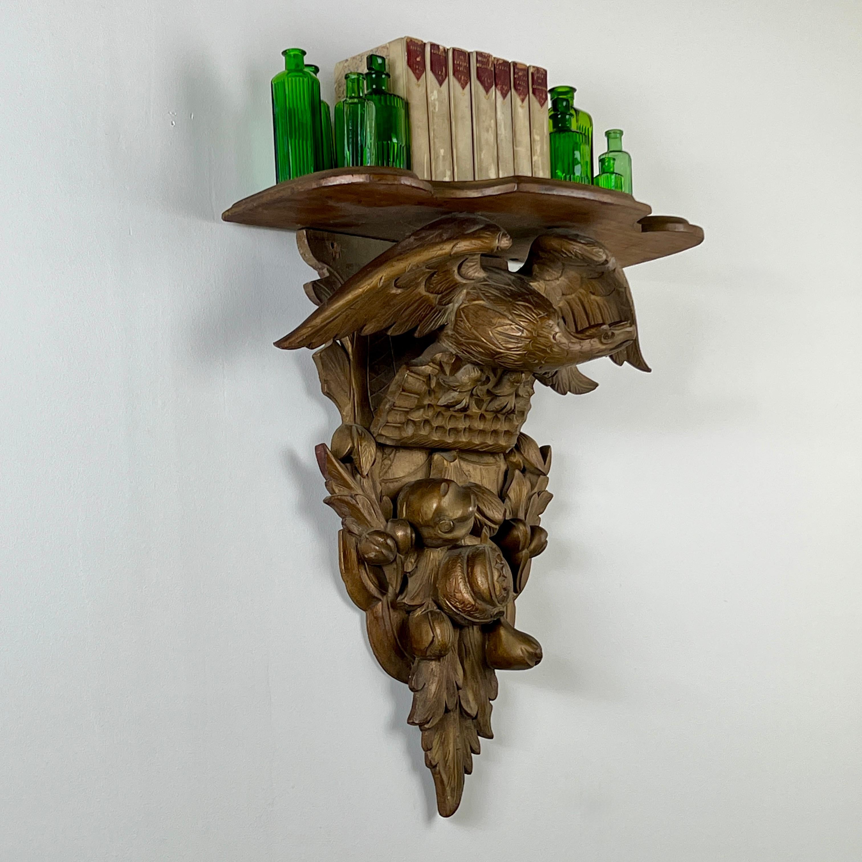Black Forest A C19th Carved Giltwood Wall Bracket For Sale