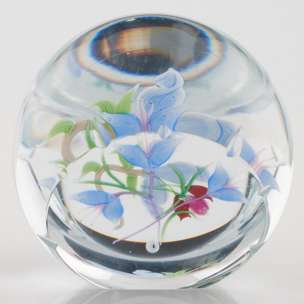 Heading : A Caithness Whitefriars Allan Scott Orchids Lampwork Paperweight 1990
Date : 1990
Origin : Scotland
Features : An intricate Orchid lampwork study on two levels
Marks : Caithness Scotland Orchids 56/250. Whitefriars monk cane within the