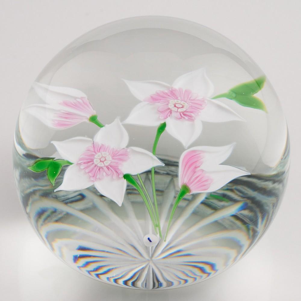 Heading : A Caithness Whitefriars Candida Allan Scott Lampwork Paperweight  1986
Date : 1986
Origin : Scottish
Features : Two lampwork flowers and buds with leaves and stems
Marks : Signed beneath Candida Caithness Scotland 41/250 plus Whitefriars