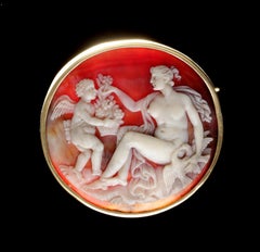 A Cameo Brooch Depicting Venus and Cupid