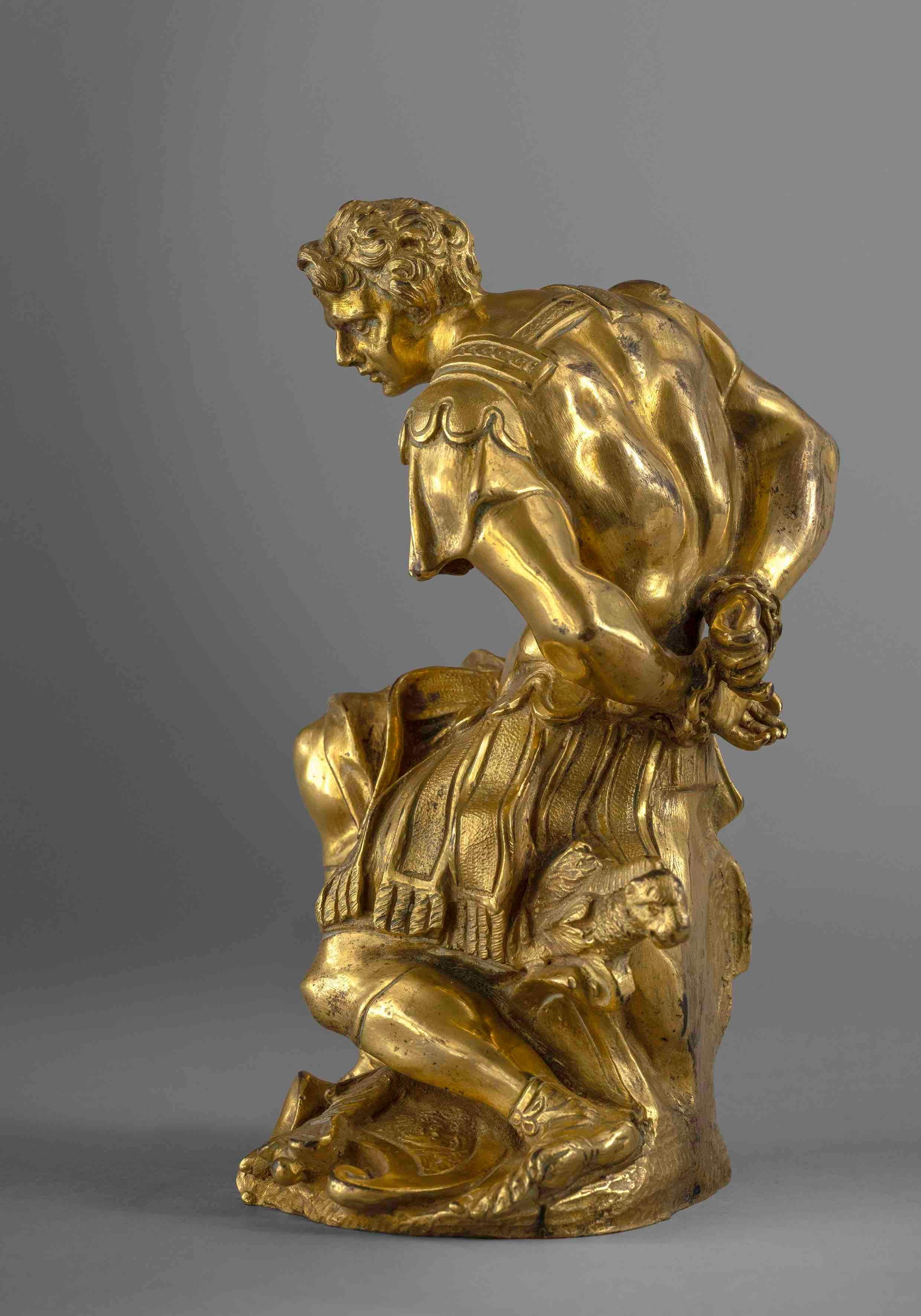 A Captive Soldier

Gilt Bronze, Lost Wax
Italie (Rome), 17th century
H 17 x Dia 10 cm
H 6 2/3 x Dia 4 inch

The 17th century witnessed a flourishing of artistic expression across Europe, particularly in Rome, where the Baroque movement reached its