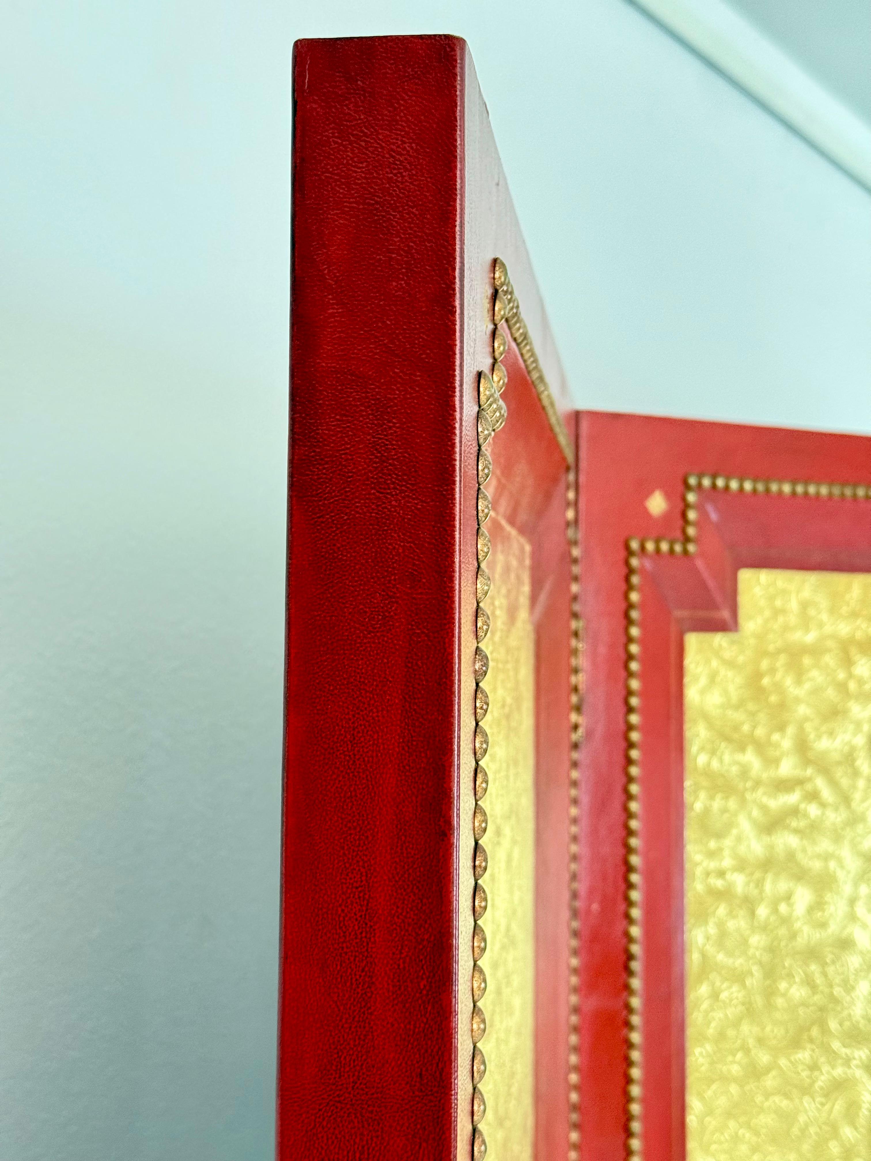 Late 20th Century A Cardinal Red and Gilt Leather Three Panel Screen after Billy Haines For Sale