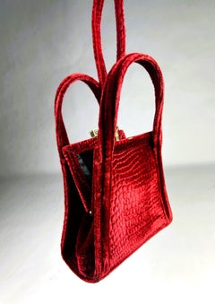 A cardinal red embossed velvet clutch bag from Lanvin - France Circa 1980 - 1990