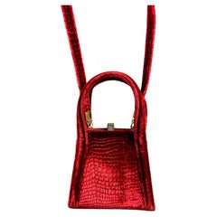 A cardinal red embossed velvet clutch bag from Lanvin - France Circa 1980 - 1990