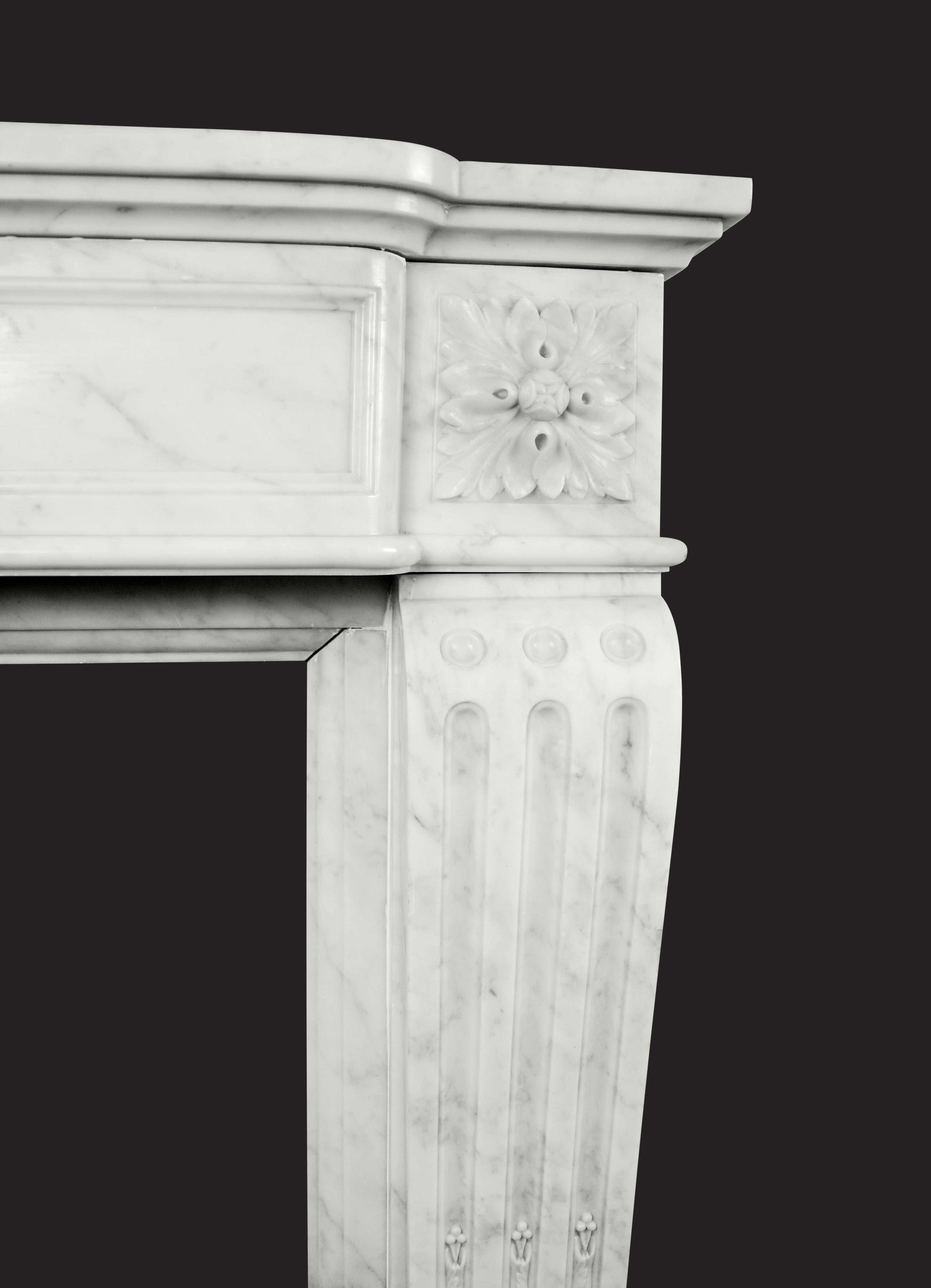 Carved Carrara Marble French Fireplace in the Louis XVI Manner For Sale