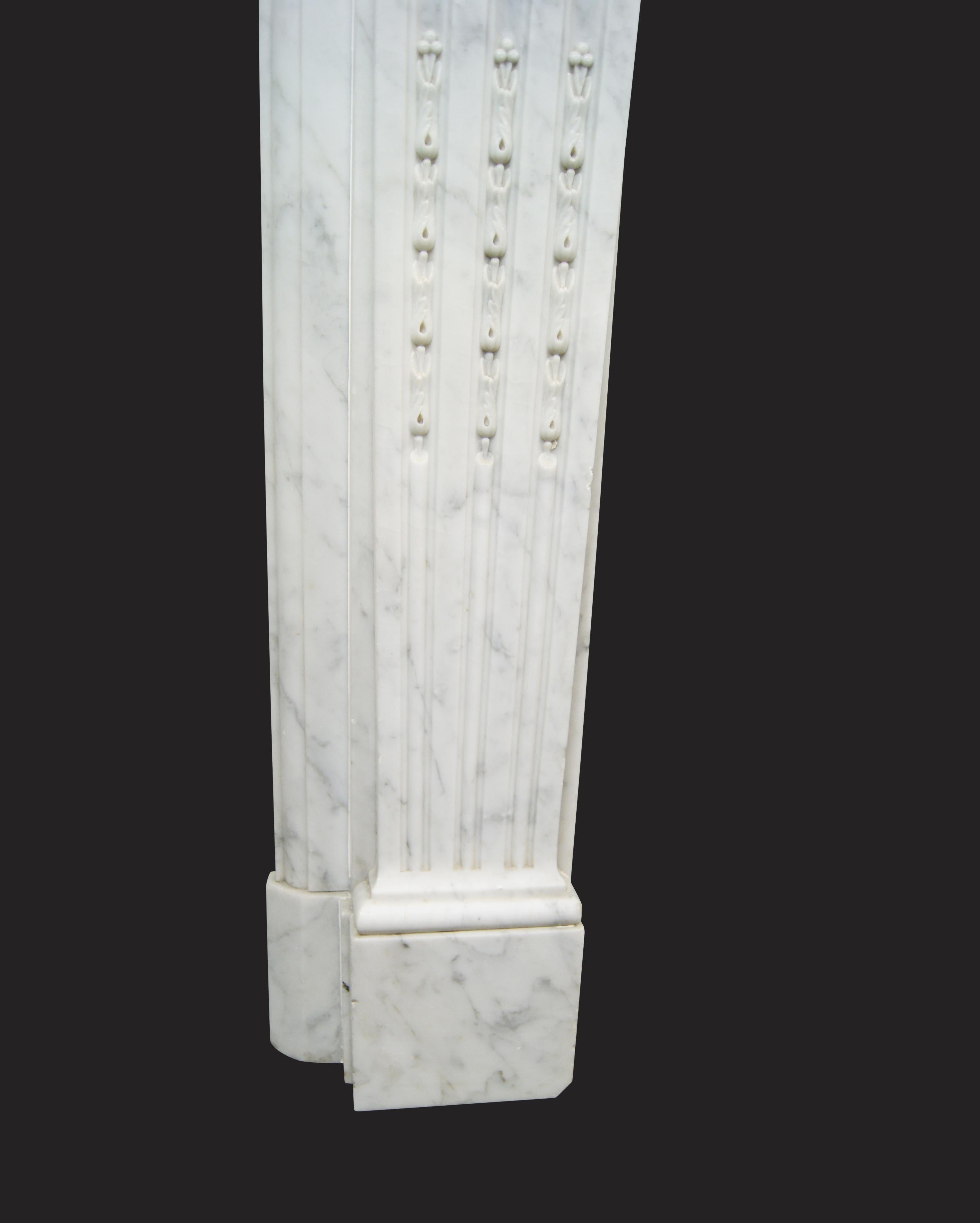 Carrara Marble French Fireplace in the Louis XVI Manner In Good Condition For Sale In London, GB
