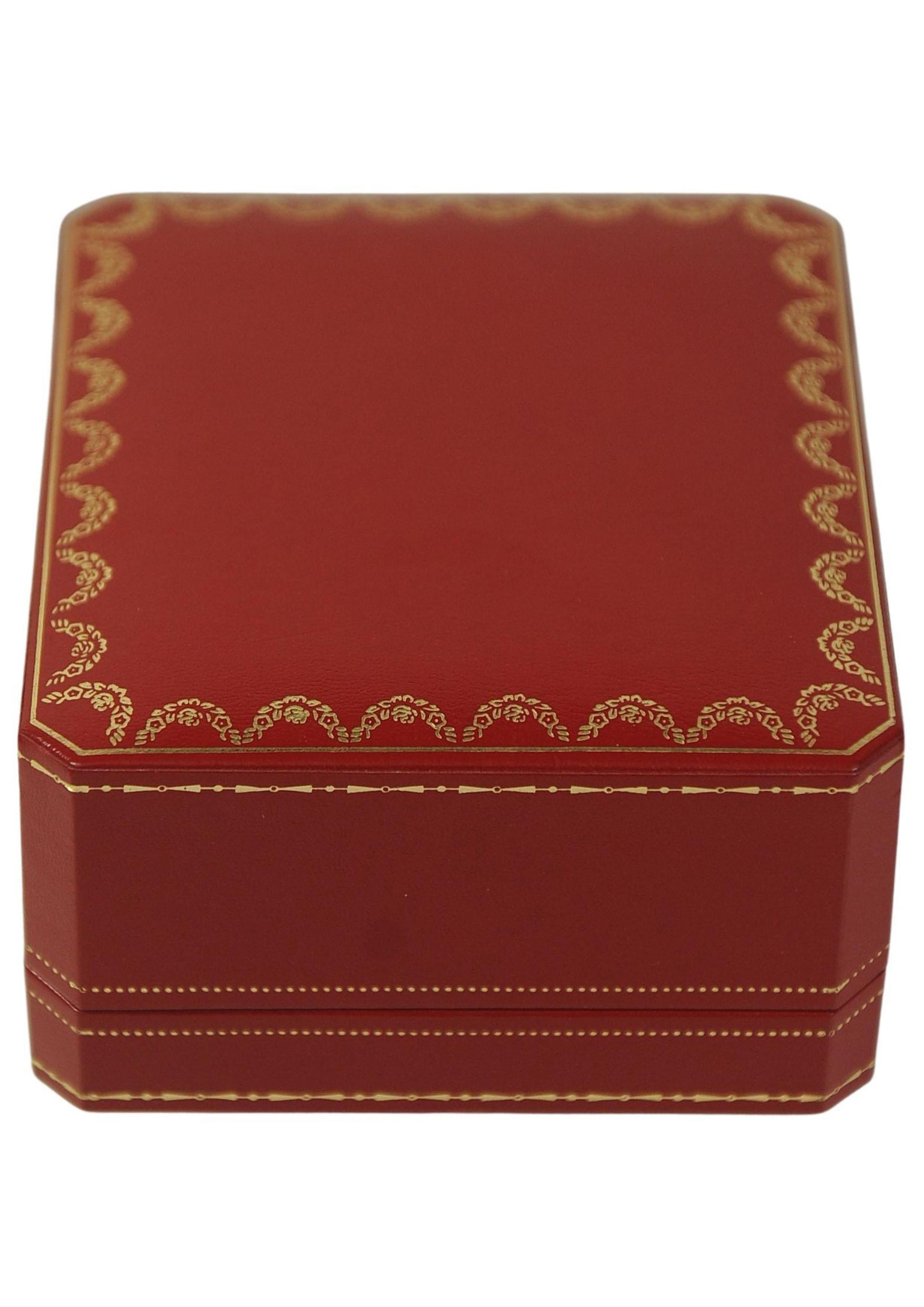 A Cartier Gold Circular Travel Clock With Cartier Red Box 5