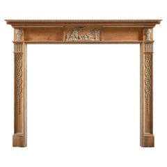 A Carved 18th Century Pine Chimneypiece in George III Style.