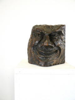 A carved and waxed wooden satyr face,  France  19th century