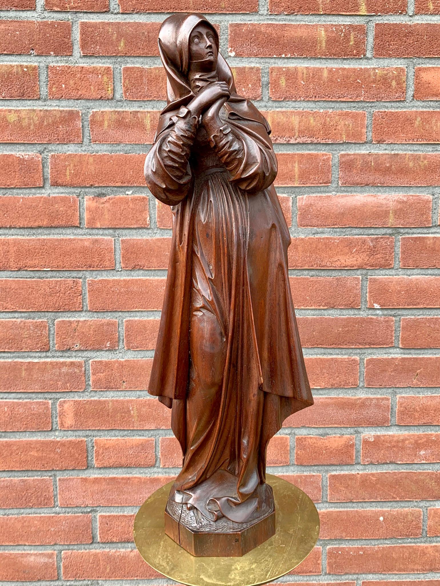 Stunning, hand carved work of devotional art with a beautiful patina.

Saint Teresa of Ávila, born Teresa Sánchez de Cepeda y Ahumada, also called Saint Teresa of Jesus (1515-1582), was a Spanish noblewoman who chose a monastic life in the Roman