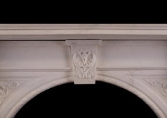 Carved Arched Marble Fireplace