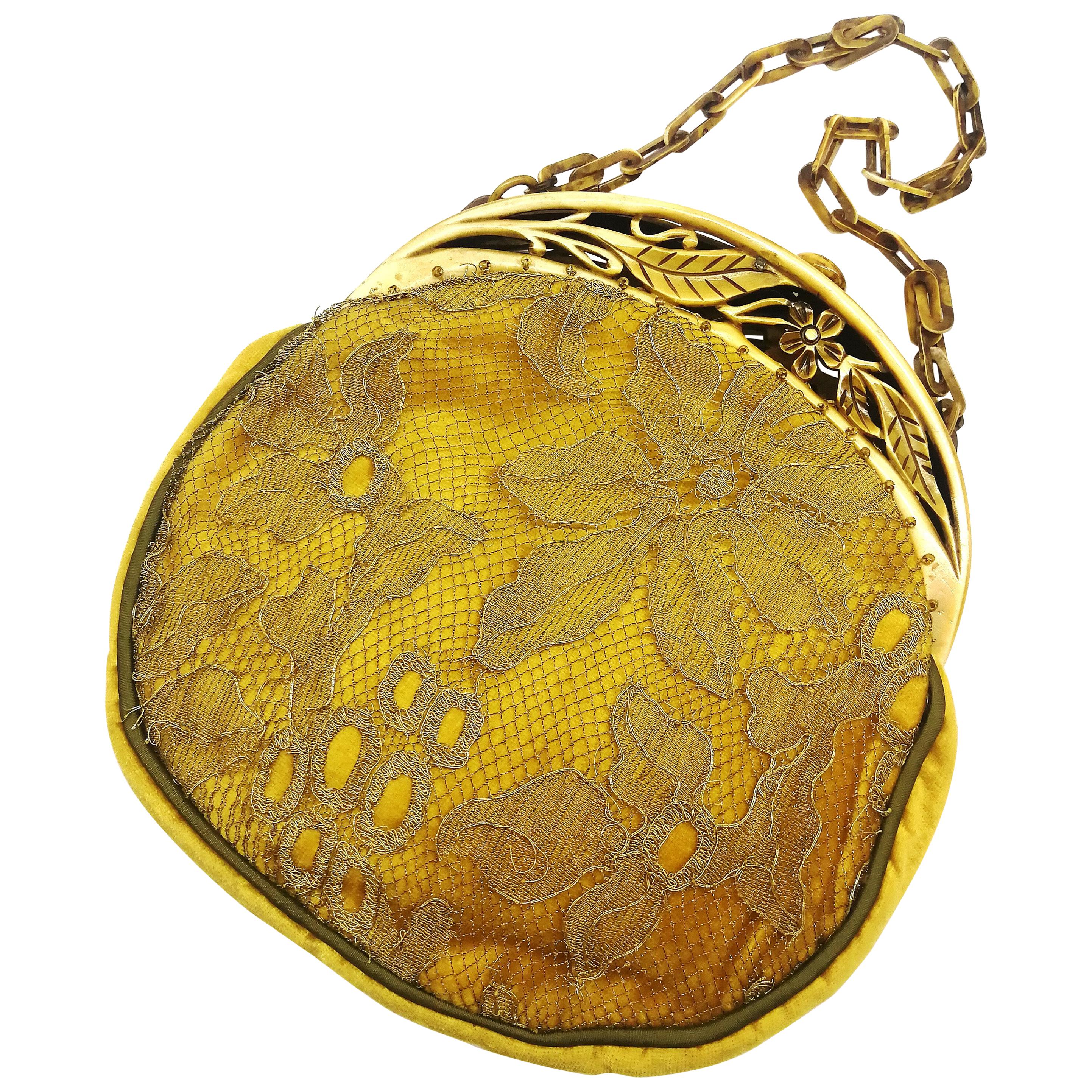 A carved Bakelite framed golden velvet handbag, France, 1920s For Sale