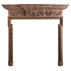 A Carved English Pine Fireplace 