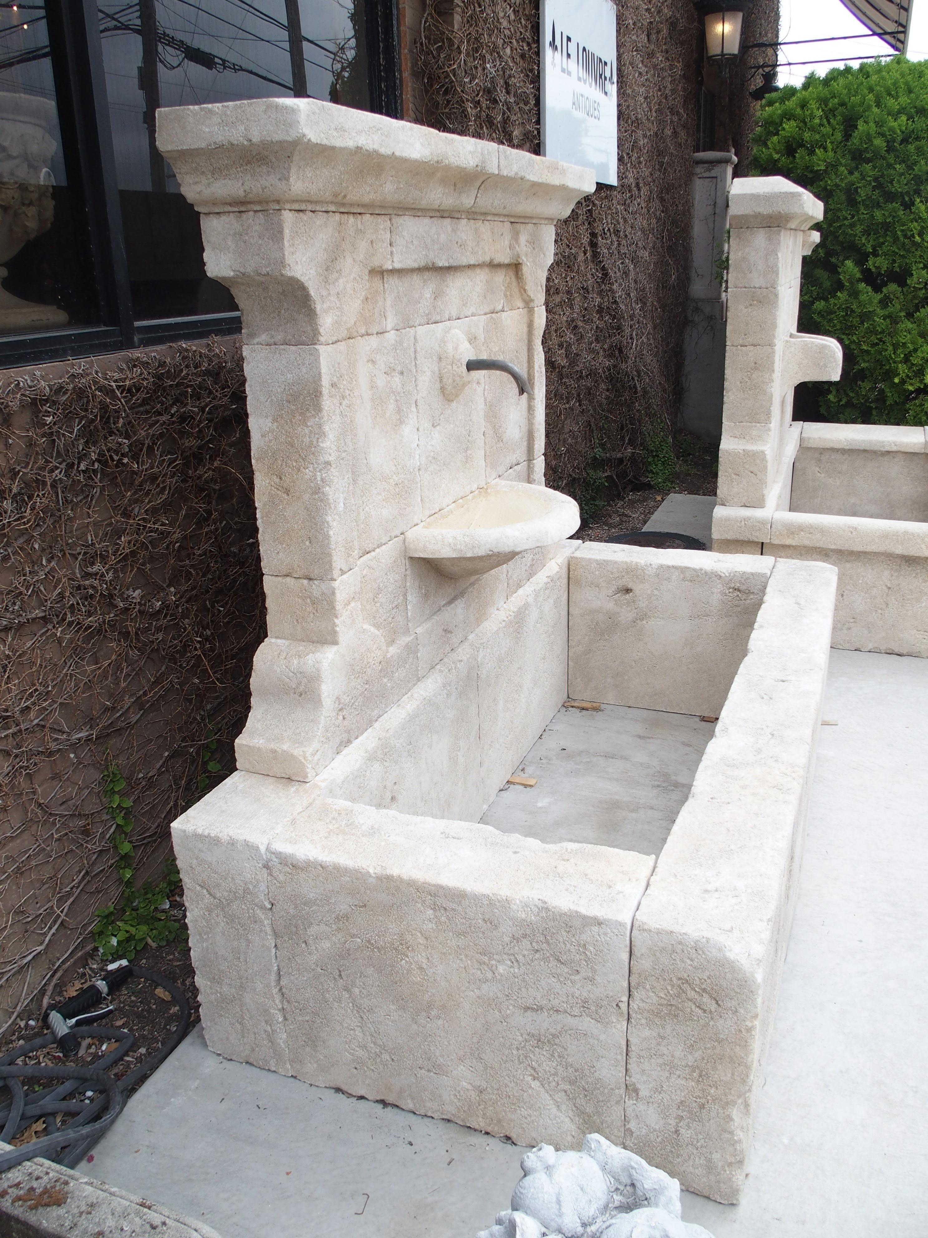 Carved French Stone Wall Fountain with Cast Iron Spout and Spill Bowl In Good Condition In Dallas, TX