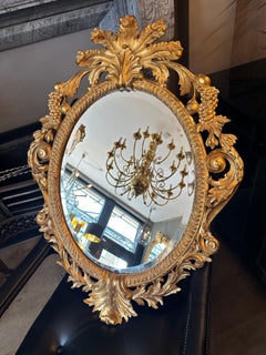 A Carved GIltwood Rococo Mirror By Harrison And Gil