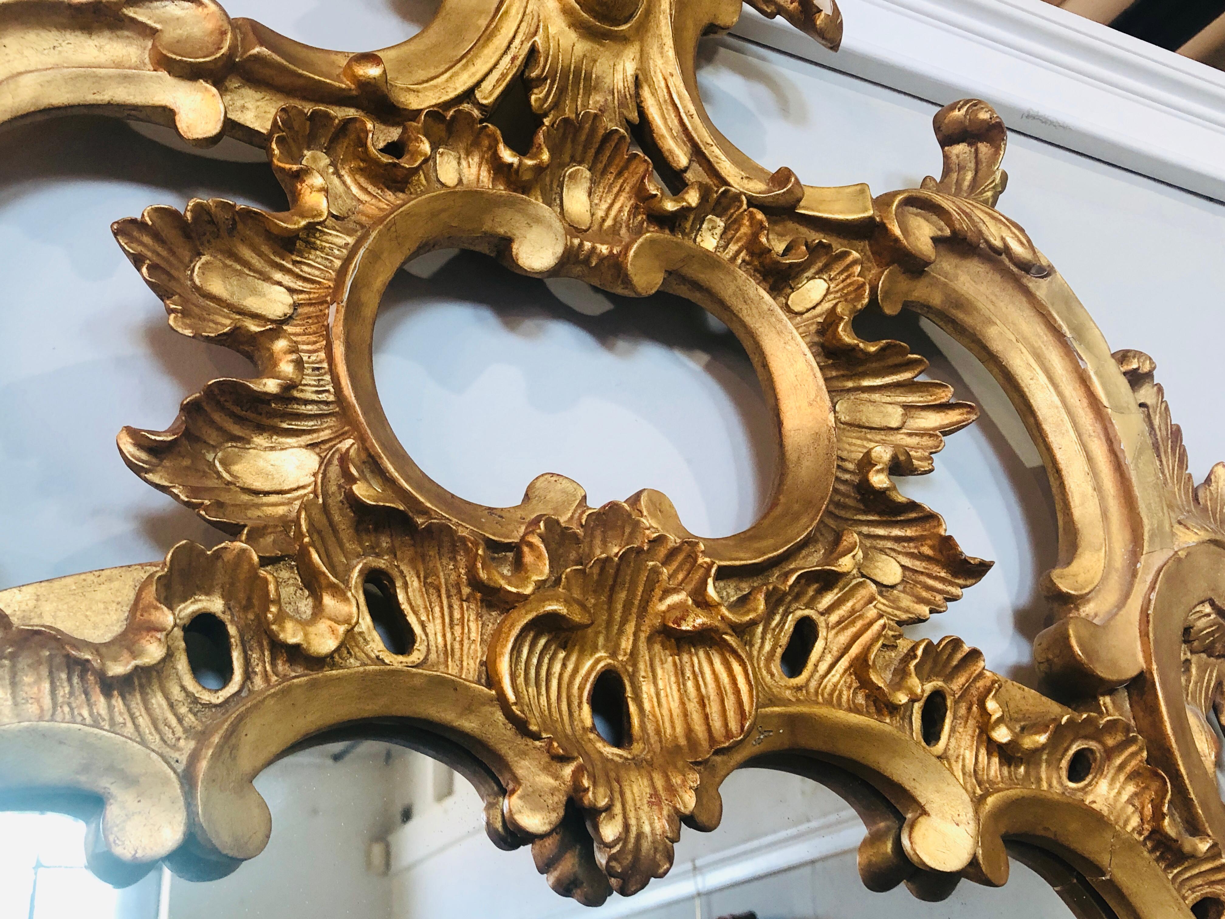 Carved Gilt Gold Leaf Italian Wall or Console Mirror in Rococo Renaissance Form In Good Condition In Stamford, CT