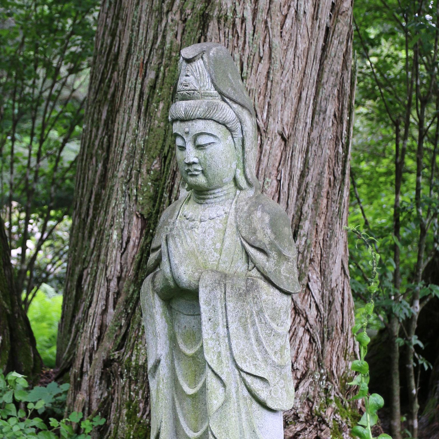 Carved Granite Guanyin in Repose In Good Condition In Katonah, NY