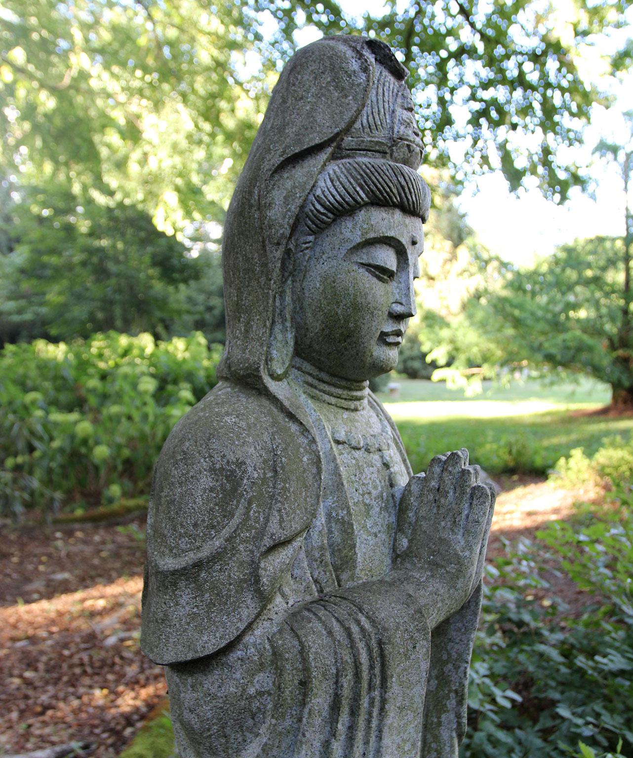Late 20th Century Carved Granite Guanyin in Repose