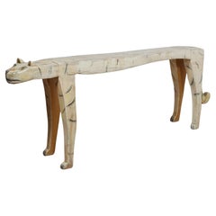 A Carved Hardwood Tiger Bench by Gerard Rigot