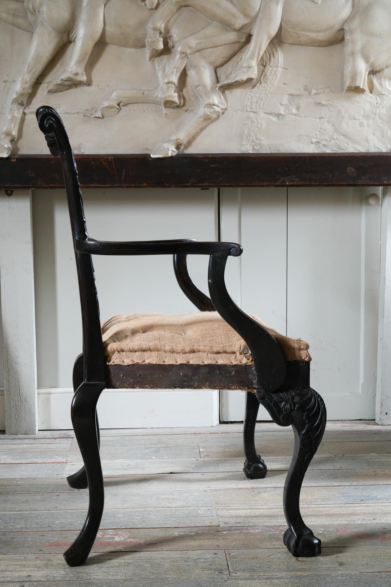 English A Carved Mahogany George II Style Open Armchair