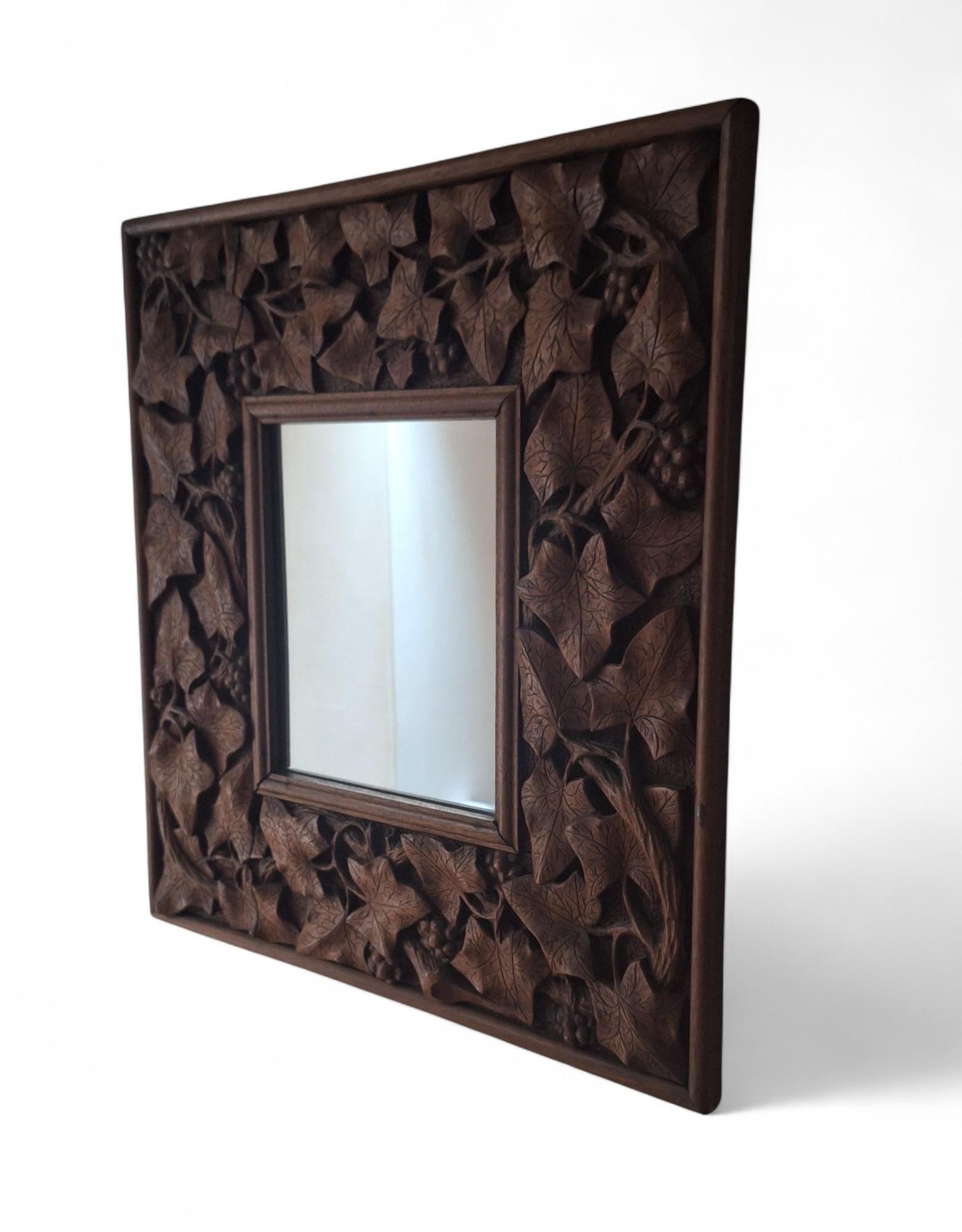 A Carved Mahogany Mirror, circa 1900 For Sale 4