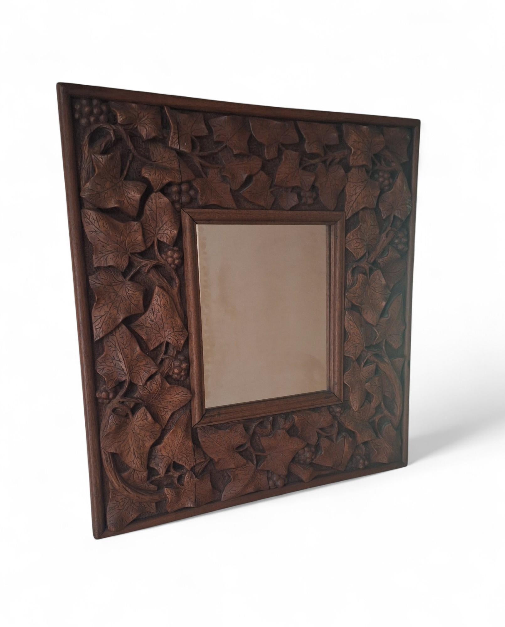 A Carved Mahogany Mirror, circa 1900 For Sale 5