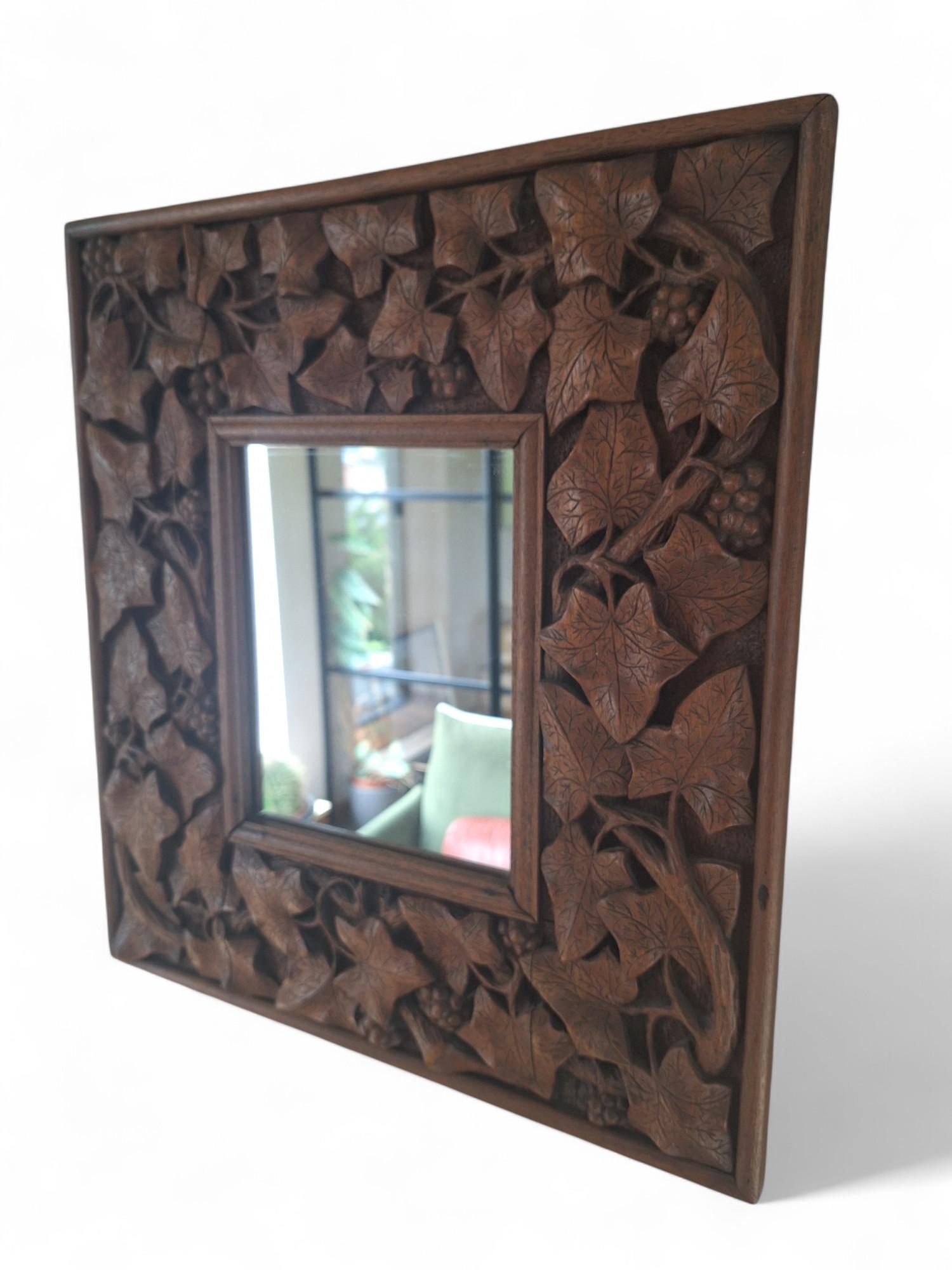European A Carved Mahogany Mirror, circa 1900 For Sale