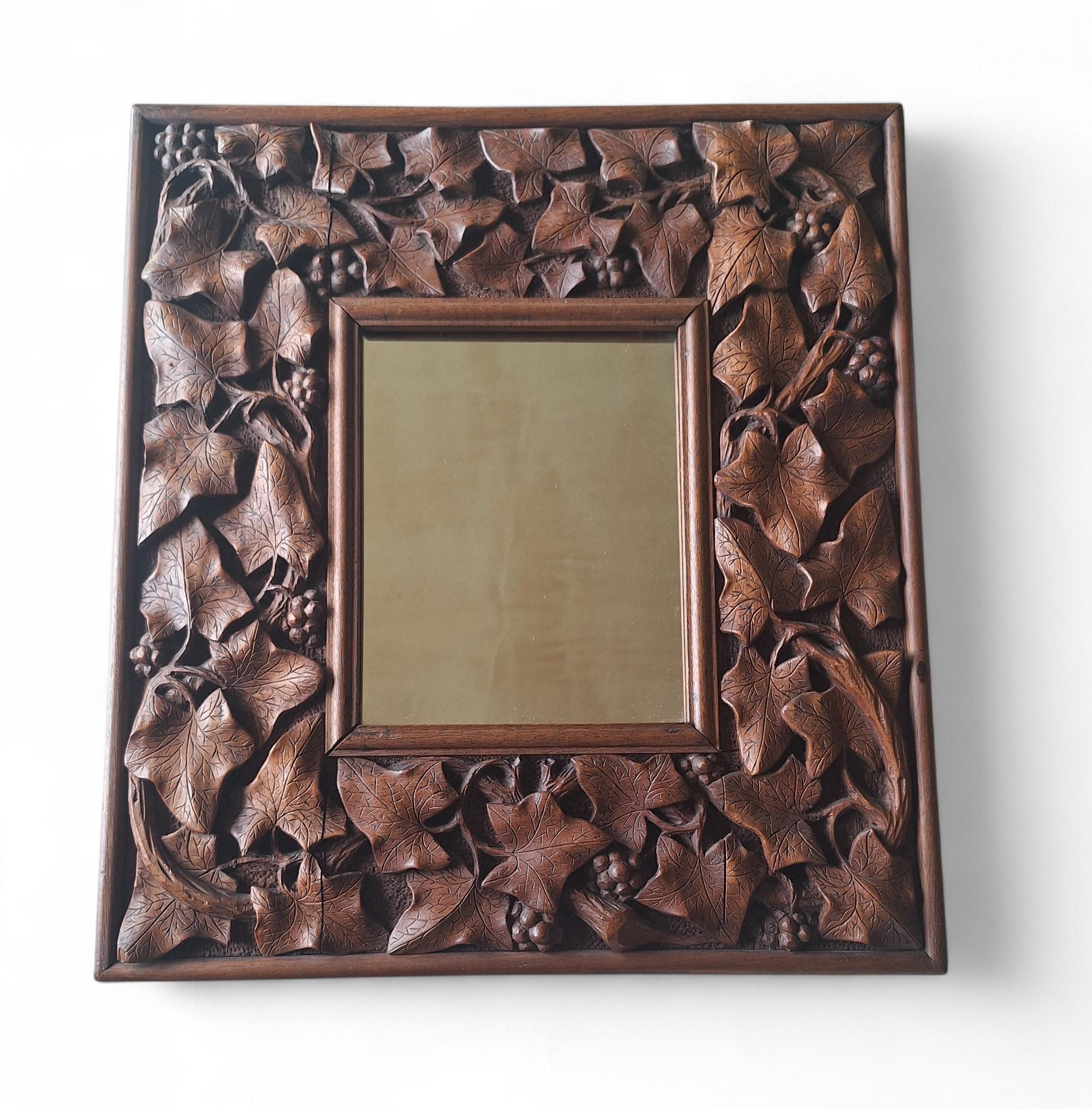 A Carved Mahogany Mirror, circa 1900 For Sale 1