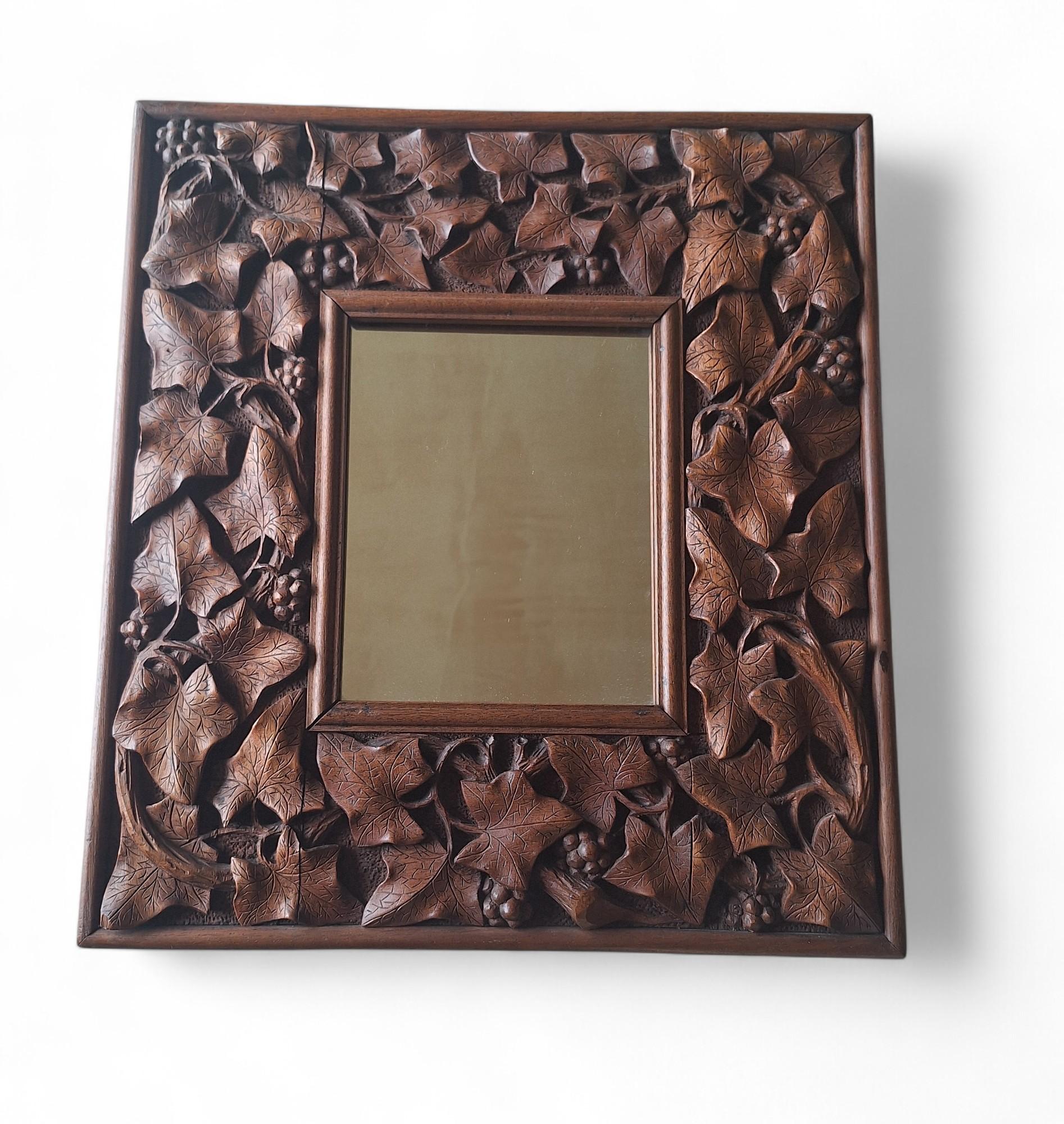 A Carved Mahogany Mirror, circa 1900 For Sale 2