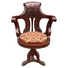 A Carved Mahogany Ship's Armchair From The White Star Line RMS Olympic
